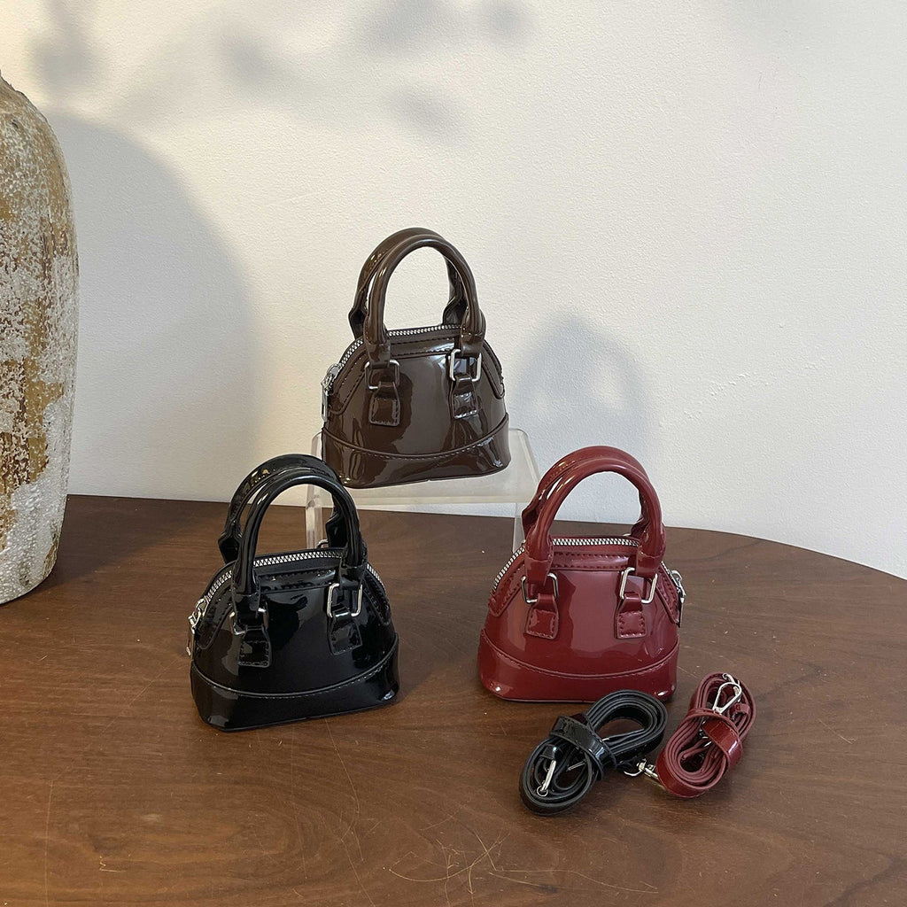 Women's mini handbag with glossy surface and fashionable zipper
