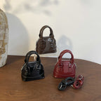 Women's mini handbag with glossy surface and fashionable zipper