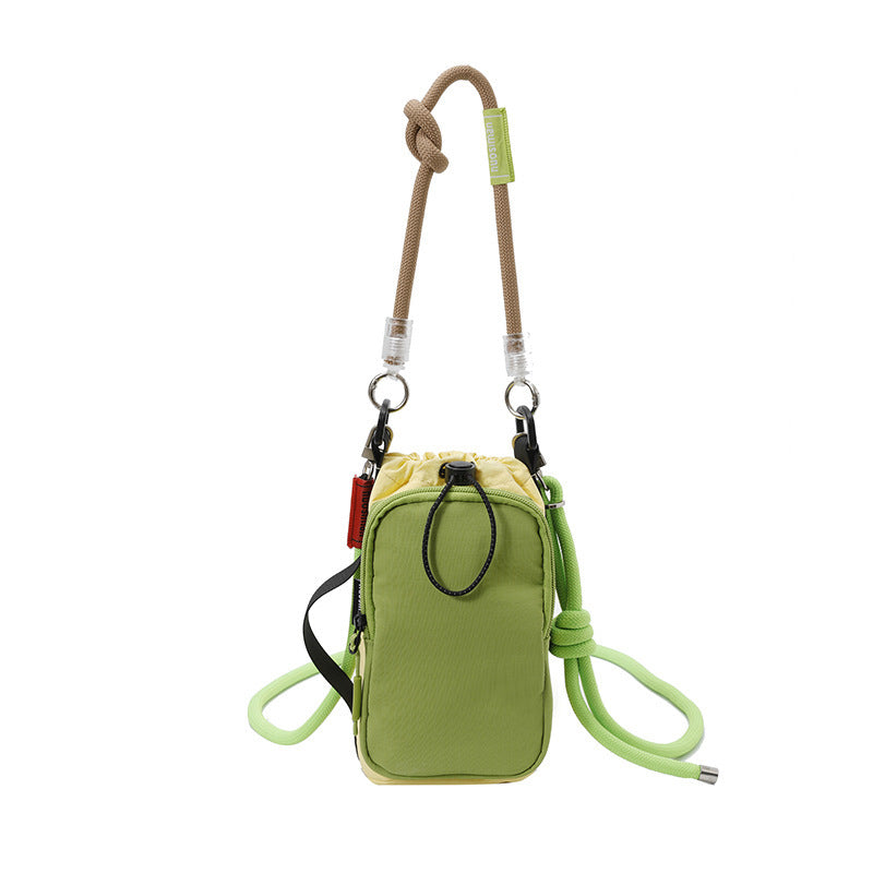 Women's multifunctional mini crossbody bag made of durable material with adjustable shoulder strap