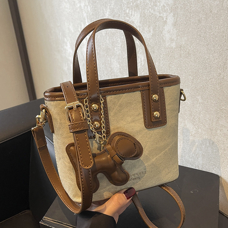 Women's mini handbag with removable charm