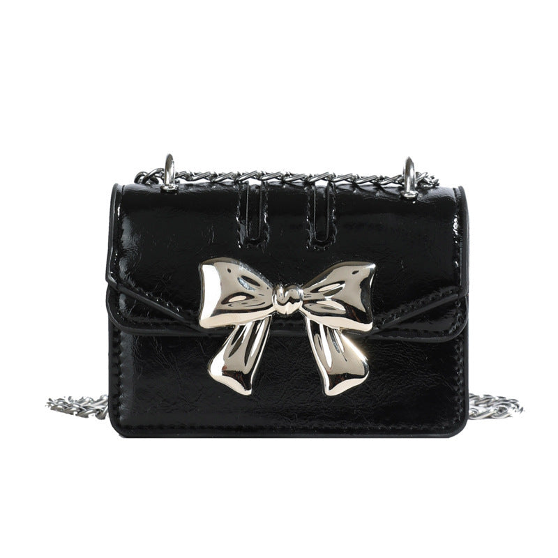 Ladies Mini Handbag with Shimmering Bow Closure
