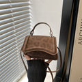 Ladies' mini handbag in retro style with removable shoulder strap