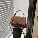 Ladies' mini handbag in retro style with removable shoulder strap