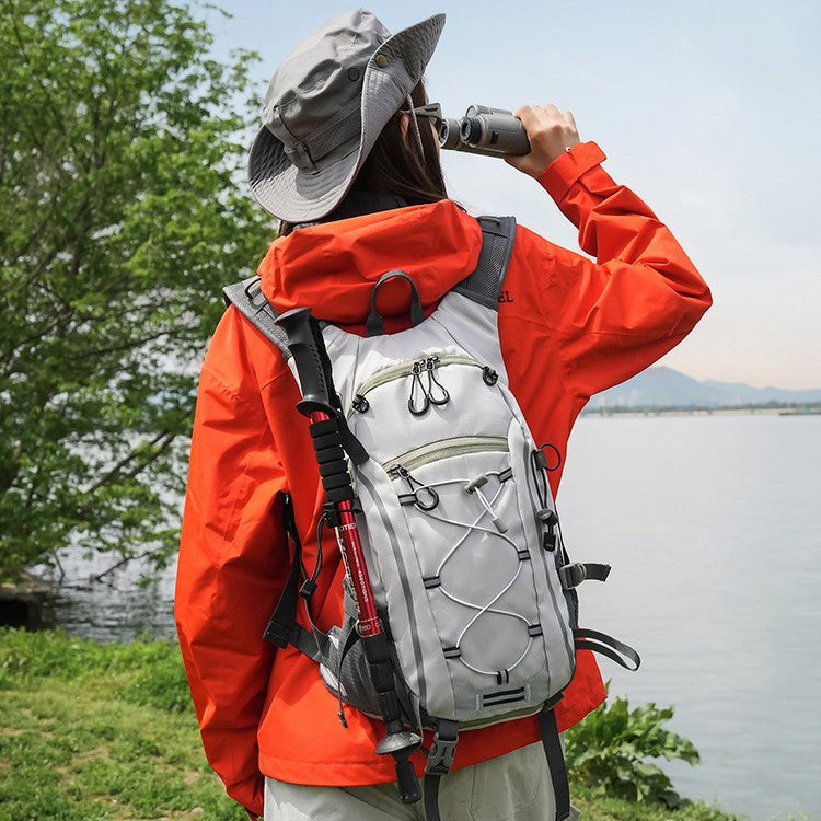 Sporty hiking backpack with ergonomic carrying system and reflective accents