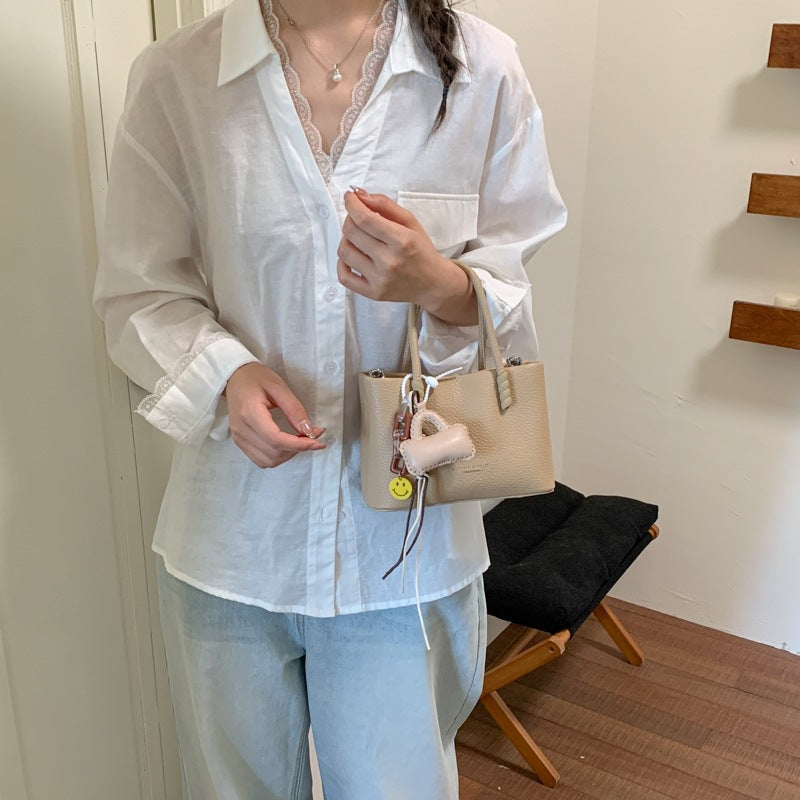 Women Mini-Handbag with fashionable drawstring