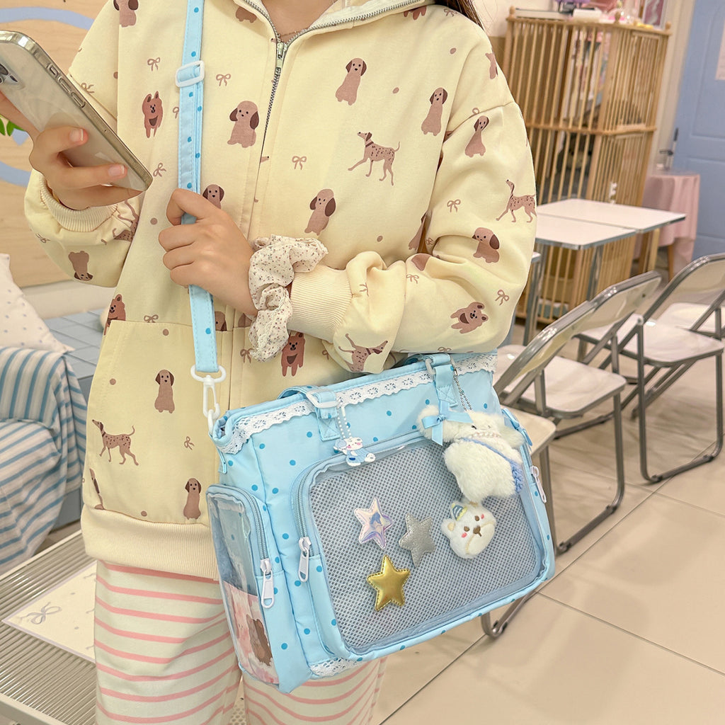 Handbag with Transparent Compartment Division and Playful Application Design