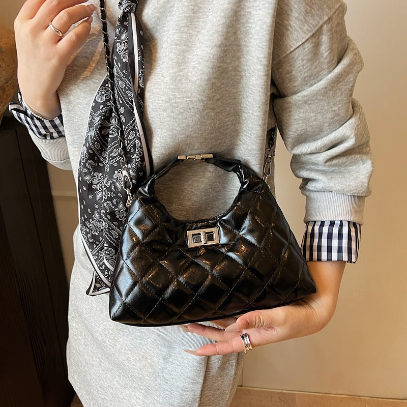 Women Mini-Bag with elegant quilted design and stylish chain closure