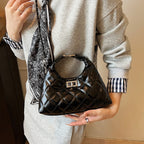 Women Mini-Bag with elegant quilted design and stylish chain closure