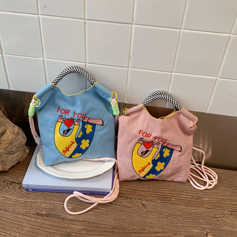 Shoulder bag with creative design and adjustable carrying system