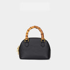 Ladies fashionable mini bag with bamboo handle and elegant leather