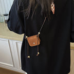 Women's mini handbag with adjustable chain strap and customizable design