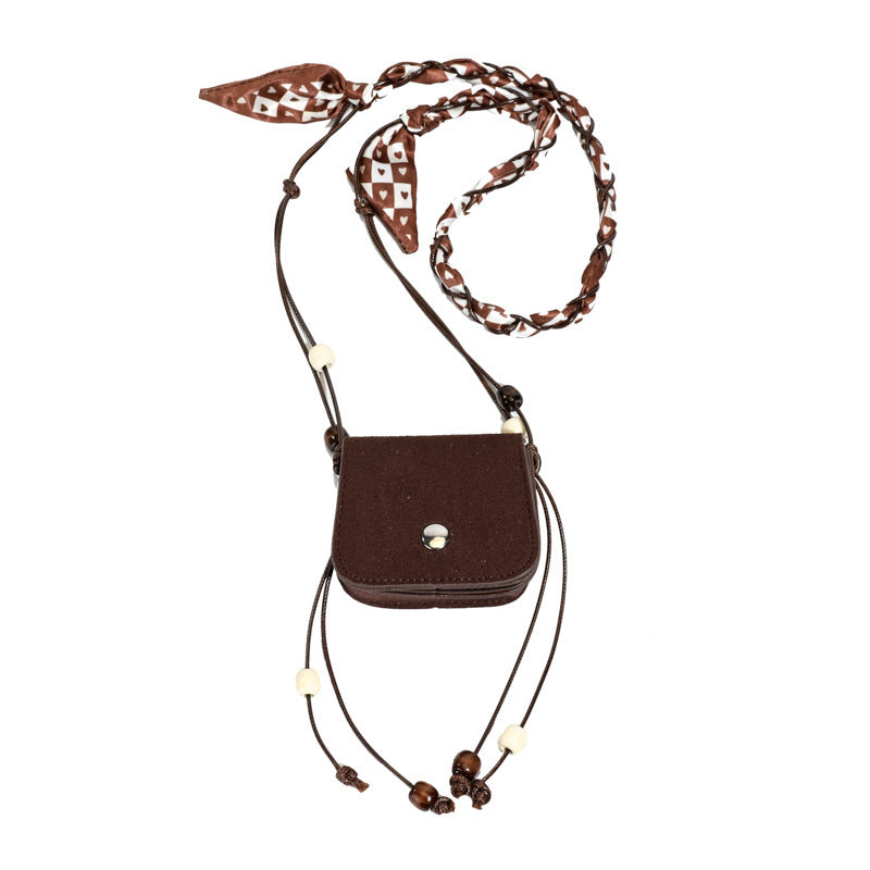 Women's mini handbag with adjustable chain strap and customizable design