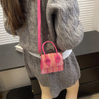 Women's mini bag with woven design and detachable shoulder strap