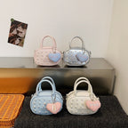 Ladies trendy mini handbag with striking pearl applications