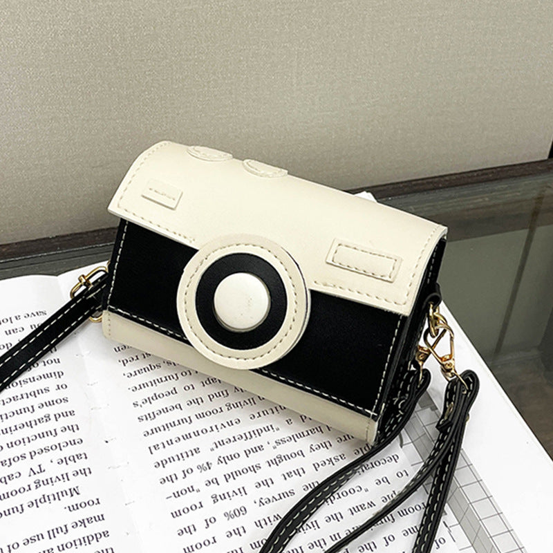 Women’s mini handbag with playful flap closure