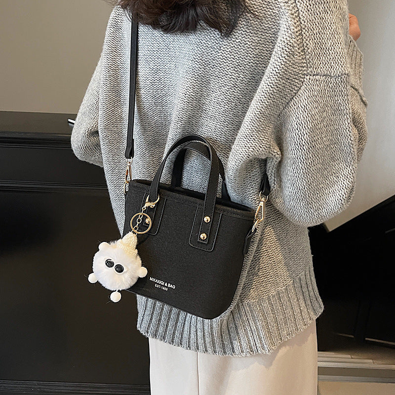 Women’s mini bag with detachable plush pendant