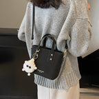 Women’s mini bag with detachable plush pendant