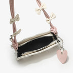 Women's mini handbag with creative wave pattern and playful pendant