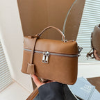 Women's mini shoulder bag with practical compartments