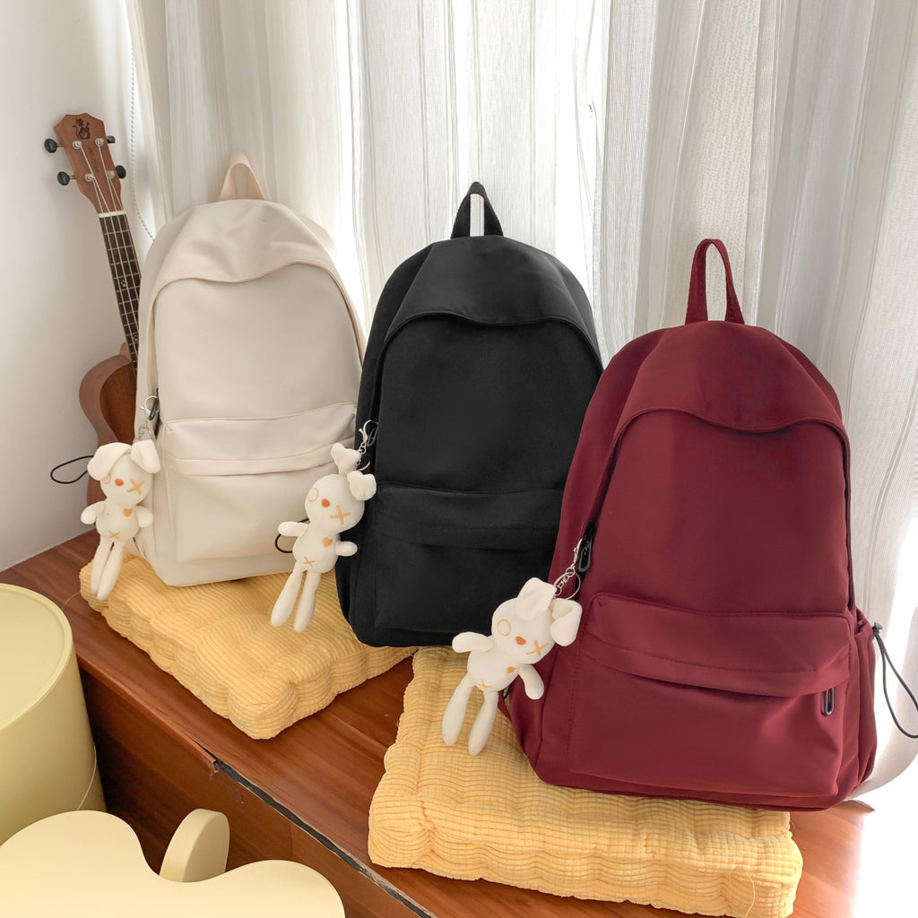 Multi-functional backpack with integrated keychain