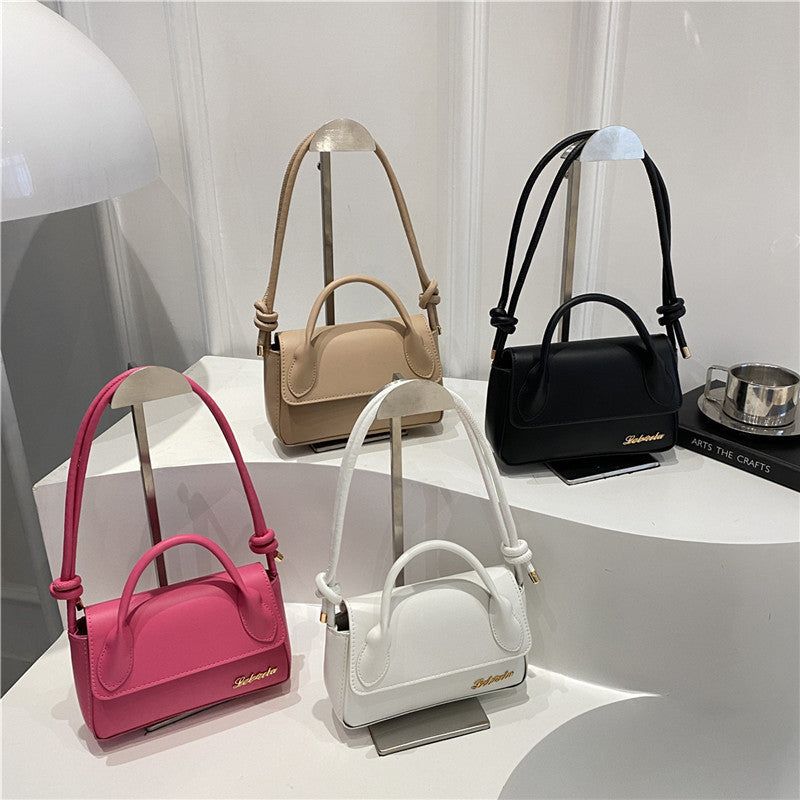 Women's mini handbag with detachable shoulder strap