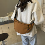 Shoulder bag with adjustable strap and multiple compartments