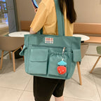 Tote bag with versatile compartments and ergonomic design