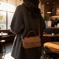Women's leather handbag with detachable shoulder strap