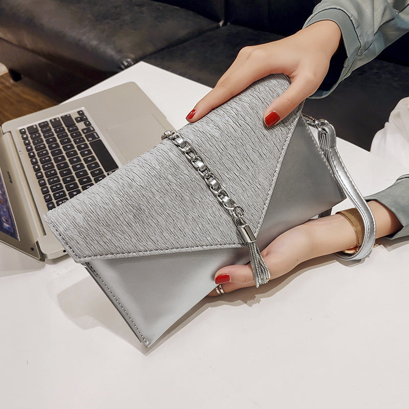 Women's clutch with stylish chain accent