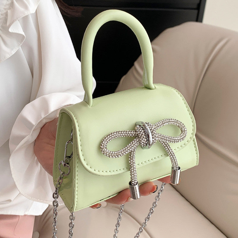 Women’s mini handbag with elegant chain closure