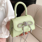 Women’s mini handbag with elegant chain closure