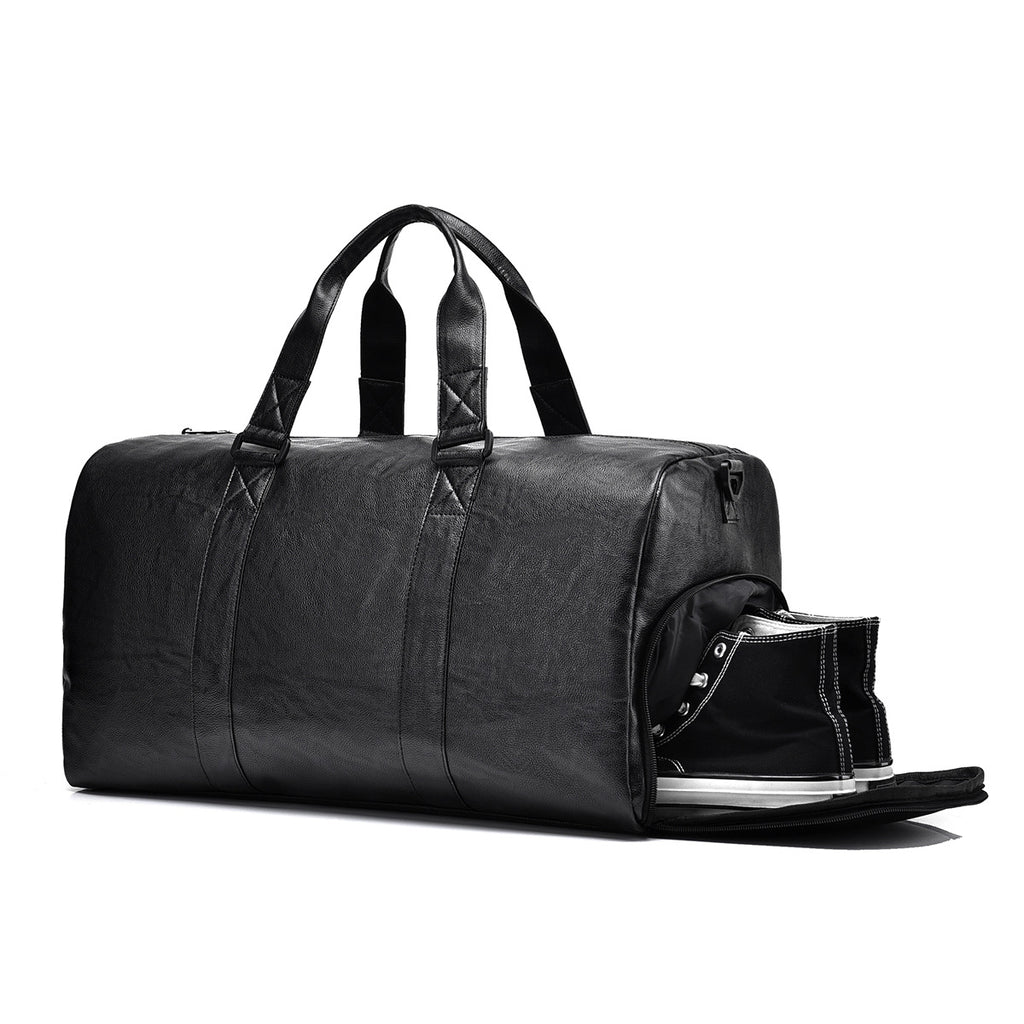 Travel bag made of high-quality leather with robust carrying handles