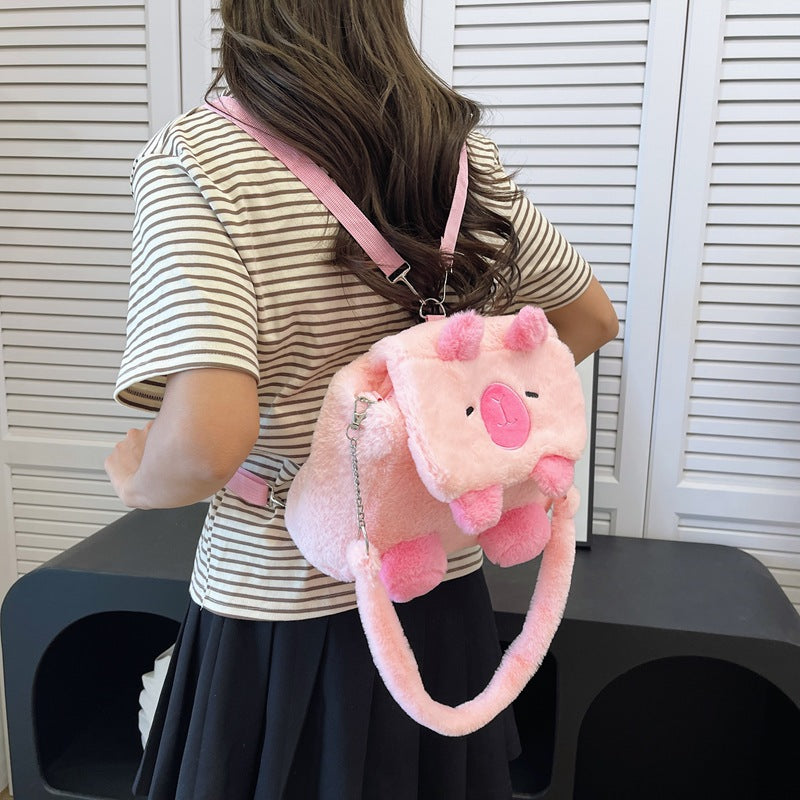 Plush shoulder bag with animal motif and shoulder strap