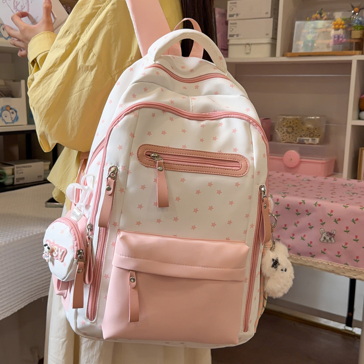 Backpack with Charming Star Applications and Practical Compartments