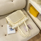 Handbag with Transparent Compartment Division and Playful Application Design
