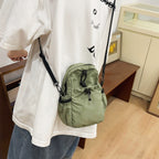 Practical crossbody backpack with multifunctional compartments