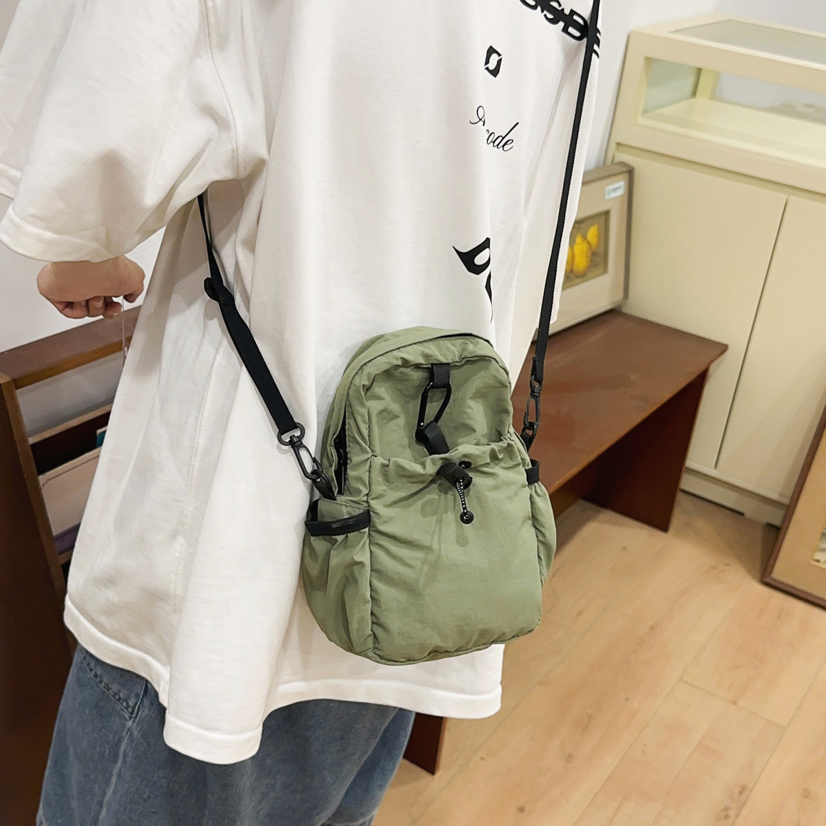 Practical crossbody backpack with multifunctional compartments