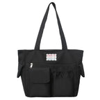 Tote bag with versatile compartments and ergonomic design