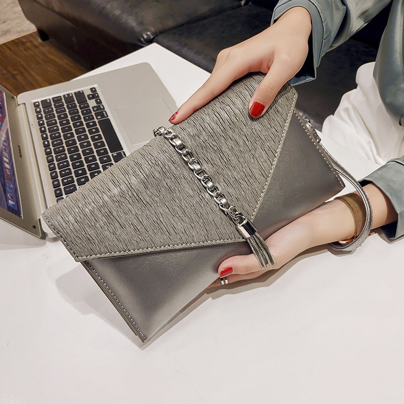 Women's clutch with stylish chain accent