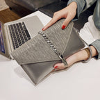 Women's clutch with stylish chain accent