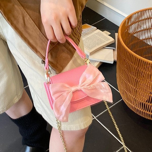 Ladies mini handbag with decorative bow design