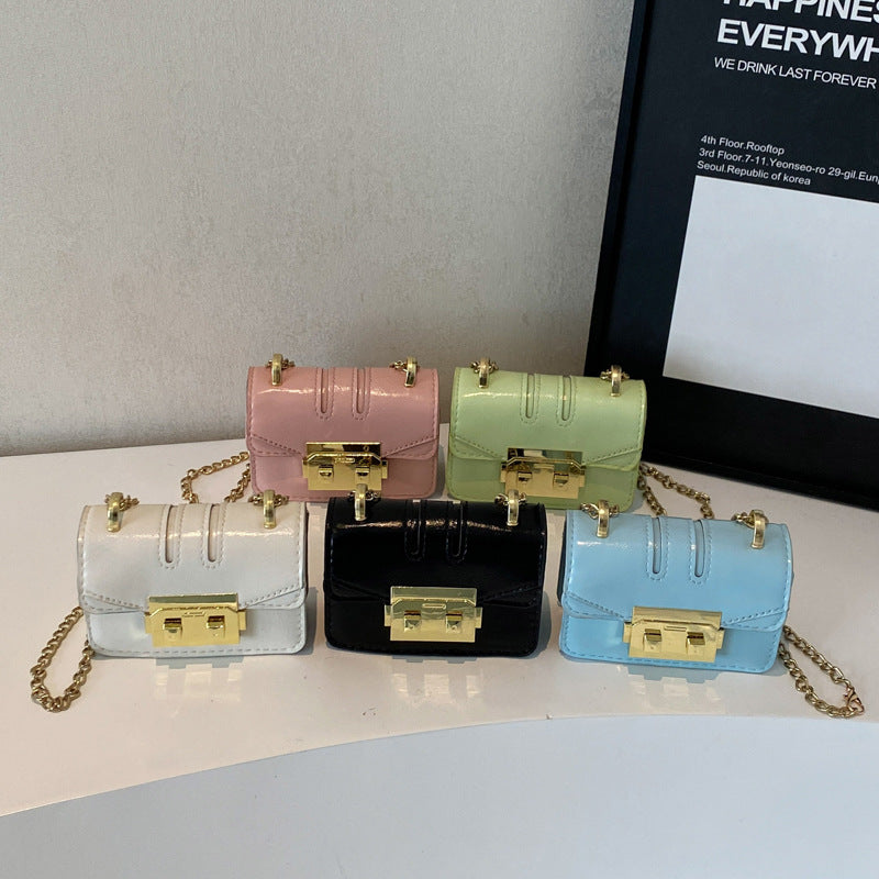 Women's mini handbag with elegant metal accents