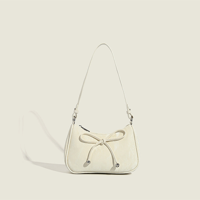 Ladies elegant mini handbag with playful drawstring