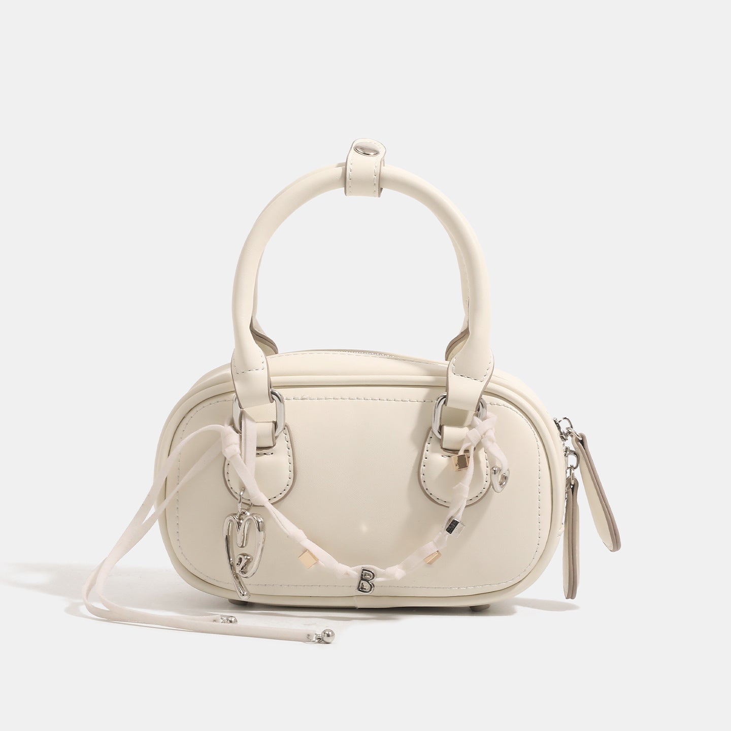 Women's mini handbag with playful drawstring and elegant accents
