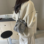 Practical shoulder bag with adjustable carrying system