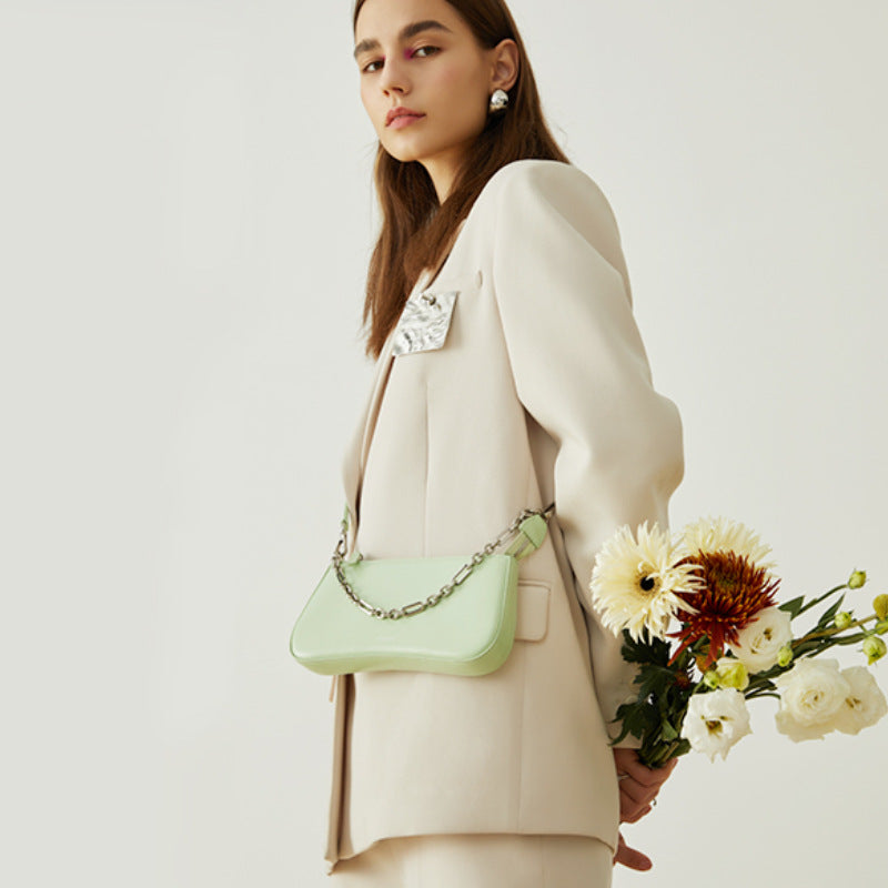 Women's elegant shoulder bag with chain accent