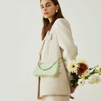Women's elegant shoulder bag with chain accent