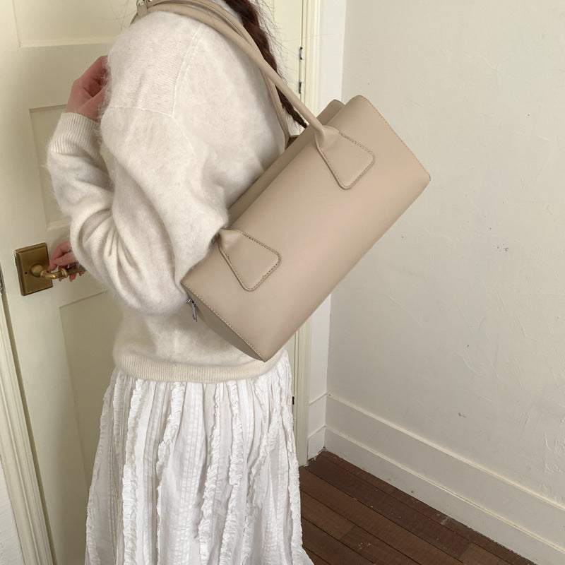Ladies elegant handbag with minimalist silhouette
