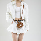 Ladies mini handbag with elegant glossy finish and removable shoulder strap