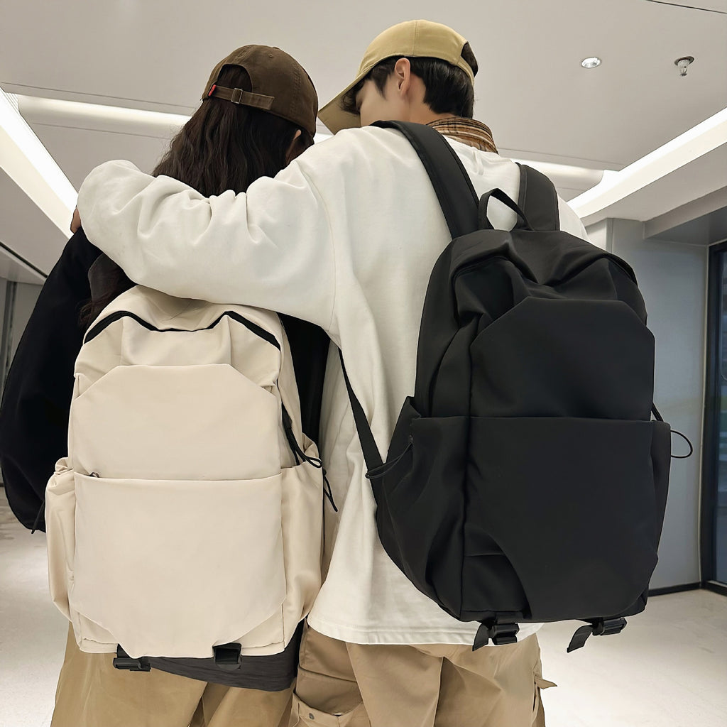 Everyday backpack with ergonomic carrying system and multifunctional pockets